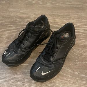 Nike Black Athletic Sneakers with Silver Swoosh Accent